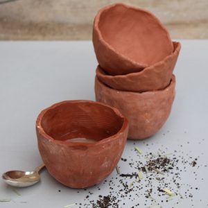 Pinched tea drinking vessels